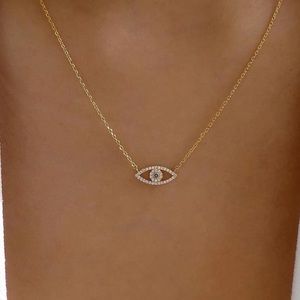 Simple Gold and Silver Eye Necklace